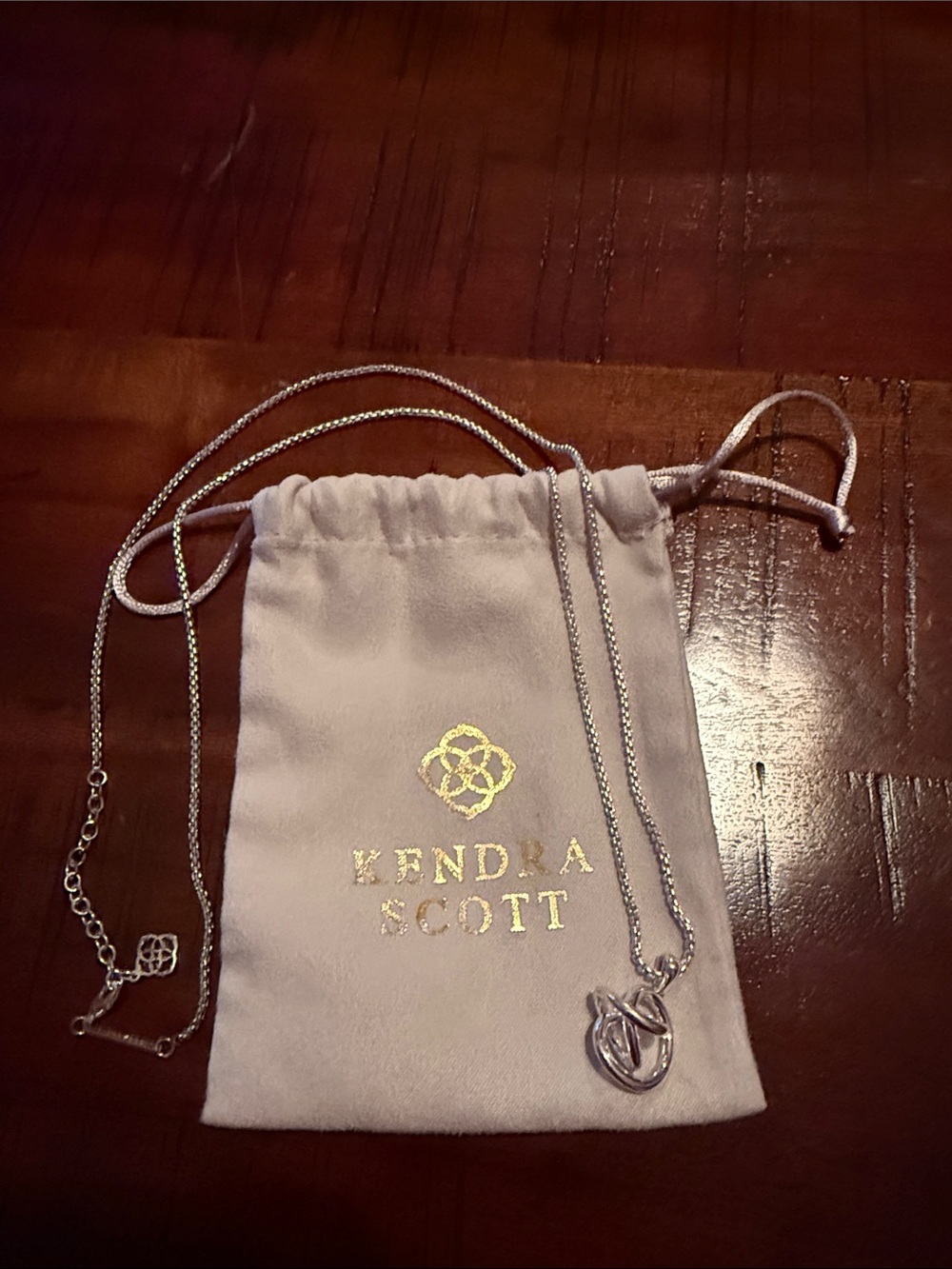 Kendra Scott Silver-tone Love Knot Necklace with Logo Pouch